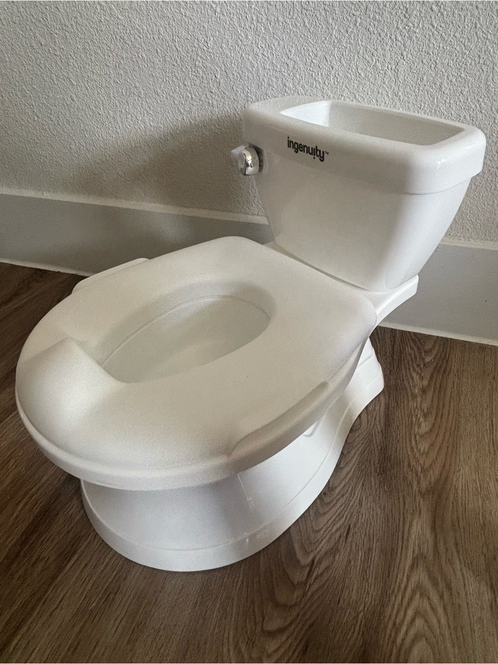 Ingenuity White Toddler Training Potty with Realistic Tank Design